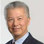 Image: photo/headshot of Asian man with salt and pepper hair wearing a suit jacket and tie